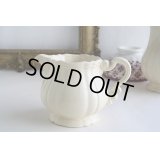 Ivory relief pitcher
